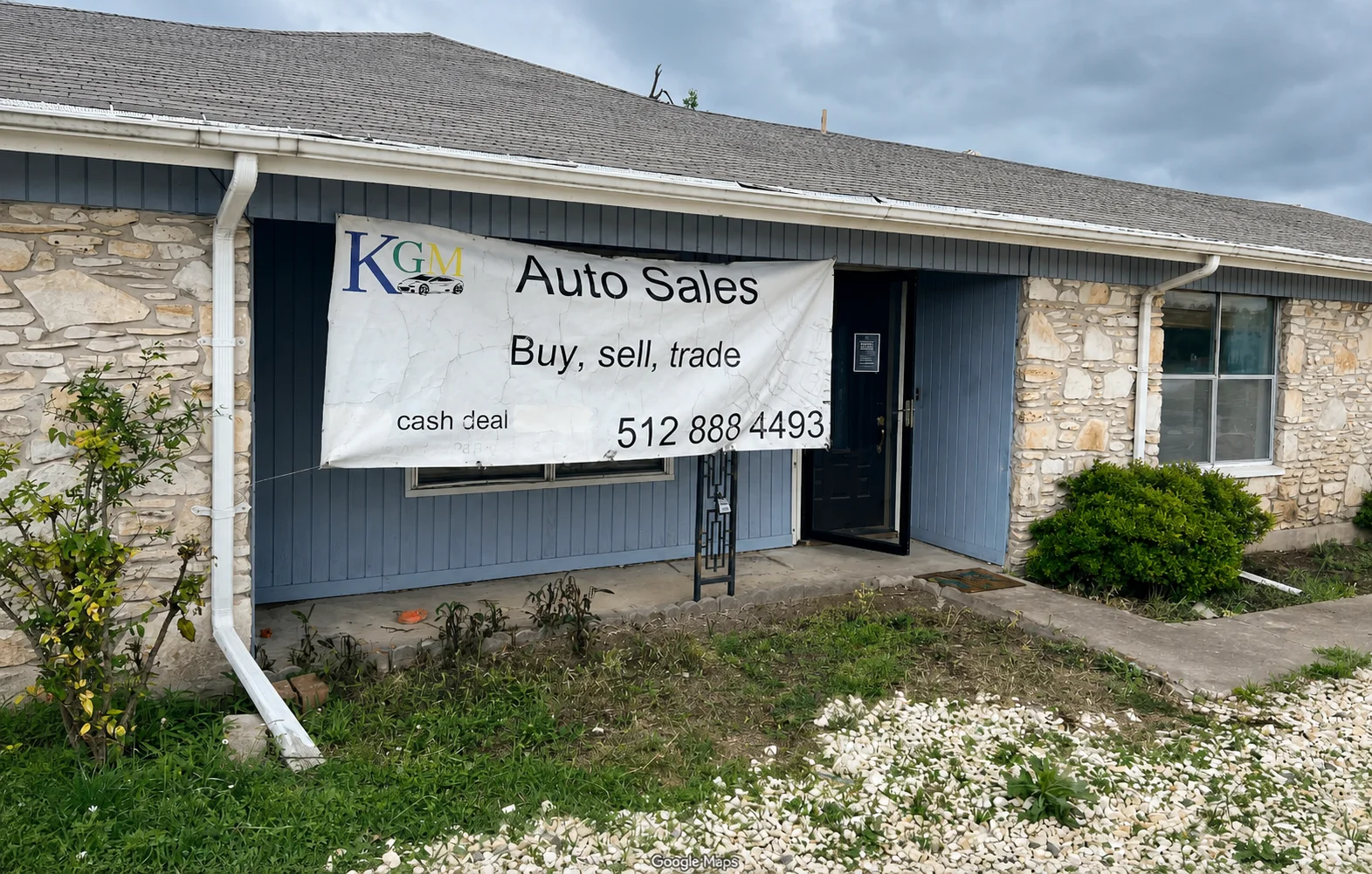 KGM Auto Sales storefront, enhanced from the supplied photograph